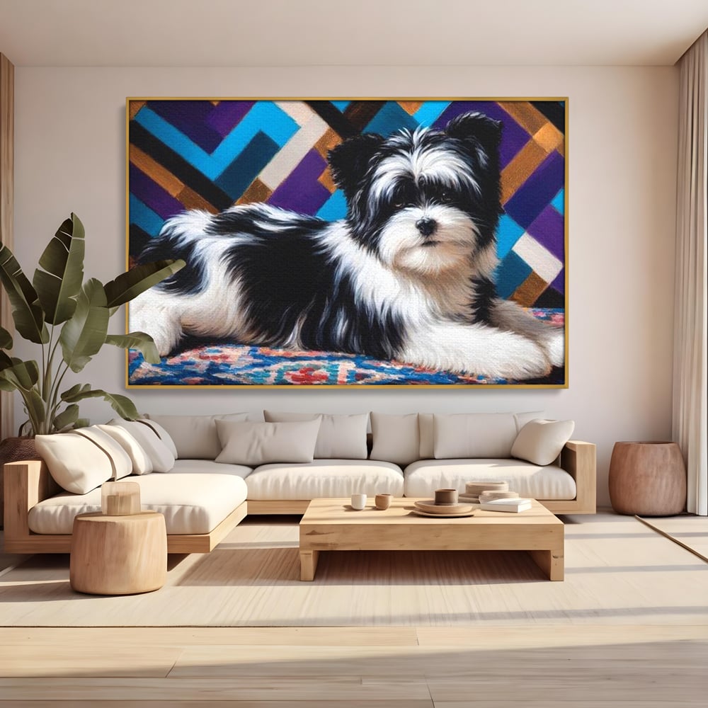 Tablou canvas cu tablou canvas cu catel pufos alb-negru, in rama de aluminiu auriu, pe perete intr-un living